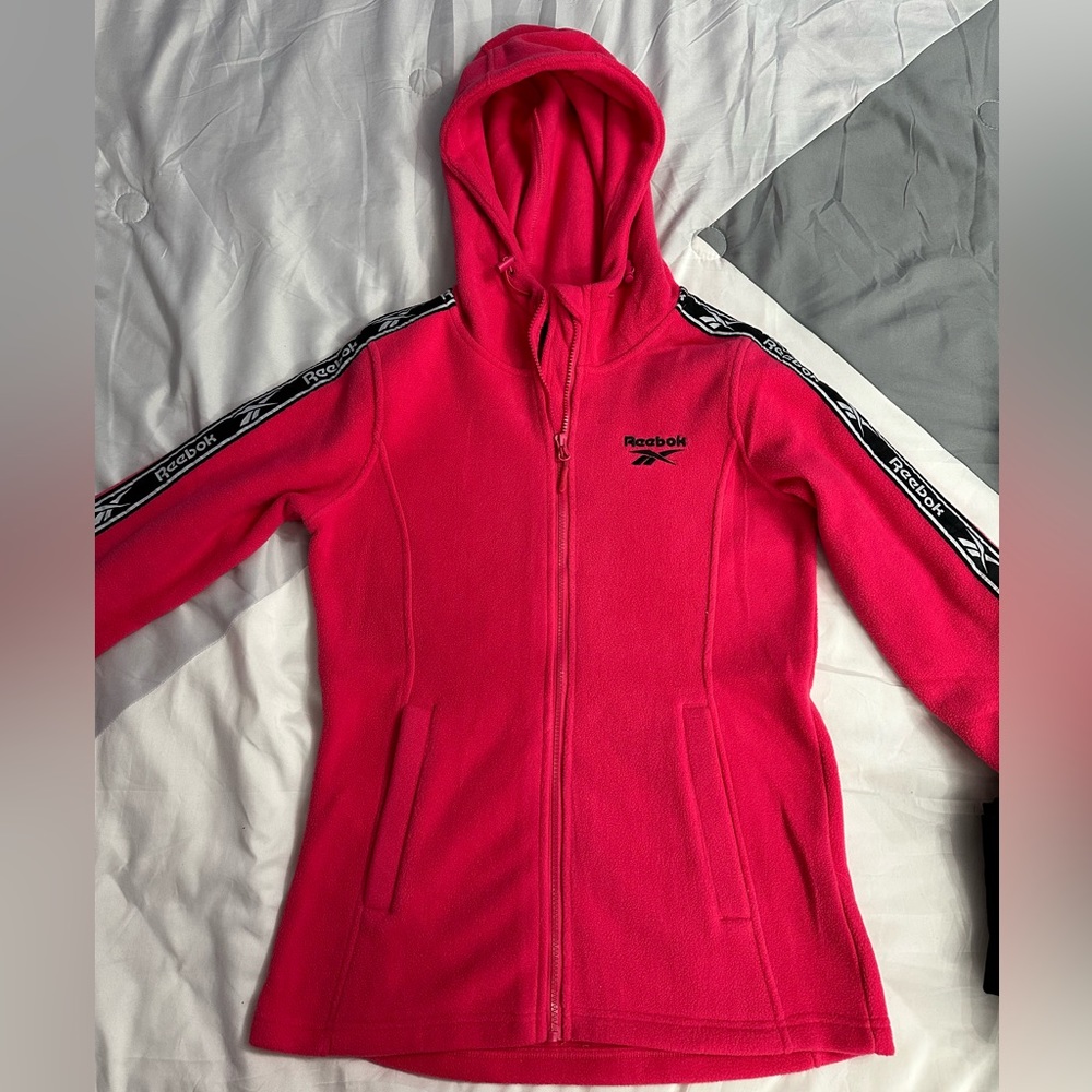 Bright pink Reebok sweater